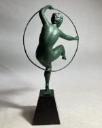 attribué à Marcel André BOURAINE (1886-1948)
Danseuse au cerceau
Groupe en régule...