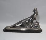 Maurice FRECOURT (1890-?)
Faisan
Sujet en métal argenté, signé, présenté sur un...