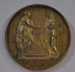 MONTAGNY Médaille ronde en argent représentant un couple devant un...