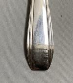 MENAGERE en métal argenté, modèle années 1950, comprenant:
- douze grandes...