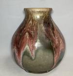 Jean POINTU (1843-1925)
Vase en grès émaillé à décor de coulées,...