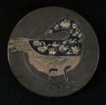 Guidette CARBONELL (1910-2008)
Grand plat circulaire sur talon à décor d'un...