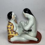 CHINE
Groupe en porcelaine représentant deux personnages à sujet érotique
H.: 11...