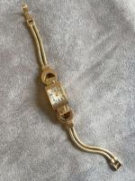 MONTRE bracelet de dame en or jaune bracelet mailles serpent...