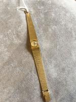 MONTRE bracelet de dame en or  de marque ASTOR...