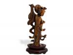 CHINE
Sujet en quartz brun représentant une femme dansant
H.: 17 cm...