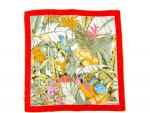 Christian DIOR
Carré soie imprimée
motif perroquets et fleurs bordure rouge
80 x...