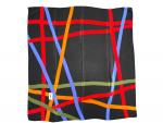 Yves SAINT LAURENT
Carré soie imprimée 
motif lignes colorées sur fond...