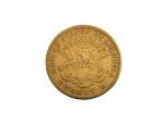 Une pièce or, 20 dollars Liberty, 1874
Lot conservé en banque,...