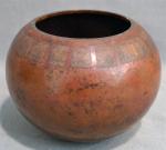 Claudius LINOSSIER (1893-1953)
Vase boule en cuivre martelé oré d'une frise...
