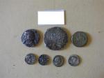 Monnaie : 7 monnaies romaines, certaines en retirage.