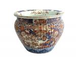 JAPON
Important cache pot en porcelaine à décor Imari
H.: 36.5 cm...