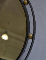 Jean ROYERE (1902-1981) 
Miroir circulaire à double cerclage en métal...