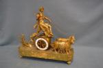 PENDULE en bronze ciselé et doré représentant le char de...