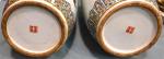 CHINE
Paire de vases en porcelaine décor floral, socles bois 
H....