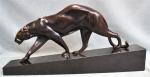 Maurice PROST (1894-1967)
Panthère marchant
Bronze patiné sur socle marbre noir signé...