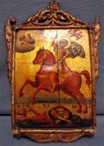 ICONE représentant Saint Dimitri
Dans un cadre doré et sculpté, apparaît...