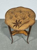 Émile GALLÉ (1846-1904)
Table de salon en bois naturel et marqueterie...