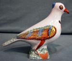 NEVERS
Pigeon épi de faitage en faience à décor polychrome
XIXème siècle
H....