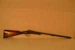 Fusil de chasse juxtaposé avec chiens apparents 
Calibre 16, crosse anglaise 
Longueur...