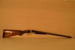 Fusil de chasse juxtaposé de marque : 
Calibre 12
Crosse pistolet
Mono détente
Longueur...
