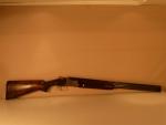 Fusil de chasse superposé de marque : winchester 
Modèle: pigeon grade
Crosse...