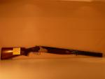 Fusil de chasse superposé de marque : Lambert 
Calibre 12 
Crosse...