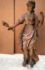 IMPORTANTE FIGURE DE PROUE en bois sculpté représentant une femme...