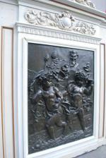 Charles LEBOURG
Trumeau en bois sculpté et patiné à décor de...