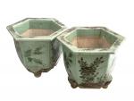 CHINE
Paire de cache pot en céramique à décor floral sur...