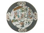 CHINE
Plat rond en porcelaine à décor polychrome de personnages
XIXème
D.: 34.5...