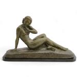 CIPRIANI (début XXème)
Femme alanguie
Bronze patiné, signé, présenté sur un socle...