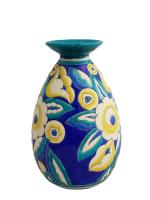 KERAMIS
Fleurs
Vase ovoïde en céramique à décor émaillé polychrome, signé et...