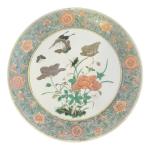 CHINE
Plat rond en porcelaine à décor végétal polychrome 
XIXème
D.: 36.5...