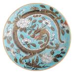 CHINE
Coupelle ronde en porcelaine à décor polychrome d'un dragon sur...