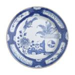 CHINE
Plat rond en porcelaine à décor bleu blanc
XIXème
D.: 26.2 cm