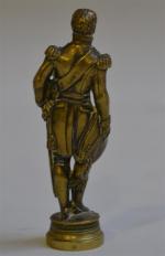 CACHET en bronze représentant un militaire en uniforme, la base...