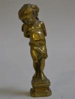 CACHET en bronze représentant un angelot, la base vierge
H.: 10...