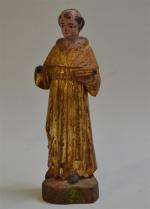 Saint PERSONNAGE en bois sculpté, peint et doré
H.: 19 cm...