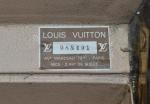 Louis VUITTON
Valise recouverte de toile monogrammée, étiquette "Louis Vuitton AVe...