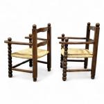 Charles DUDOUYT (1885-1946)
Paire de fauteuils en bois naturel, l'assise paillée
Années...