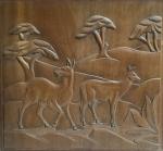 Paire de PANNEAUX en bois sculpté représentant des animaux sauvages
Dans...