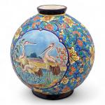 LONGWY
Vase boule en céramique émaillé à décor de trois hérons...