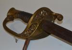 Sabre d'Adjudant, modèle 1855. Garde à une branche, en laiton....