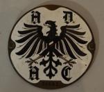 Plaque circulaire émaillée, à décor de l'aigle prussienne, marquée "...