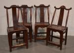 CHINE
Quatre chaises en bois teinté, piètement à entretoise (accidents)