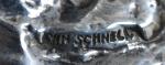 W.N. SCHNELL (XXème)
Tireur d'arc
Mascotte automobile en métal argenté, signée et...