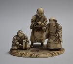 JAPON
Sujet en ivoire sculpté représentant trois personnages sur une terrasse
XIXème
H.:...