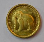 MORLON Médaille ronde en métal doré Exposition coloniale internationale Paris...