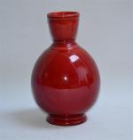 Paul MILET (1870-1950) pour SEVRES
Vase en faïence rouge dite sang-de-boeuf,...
